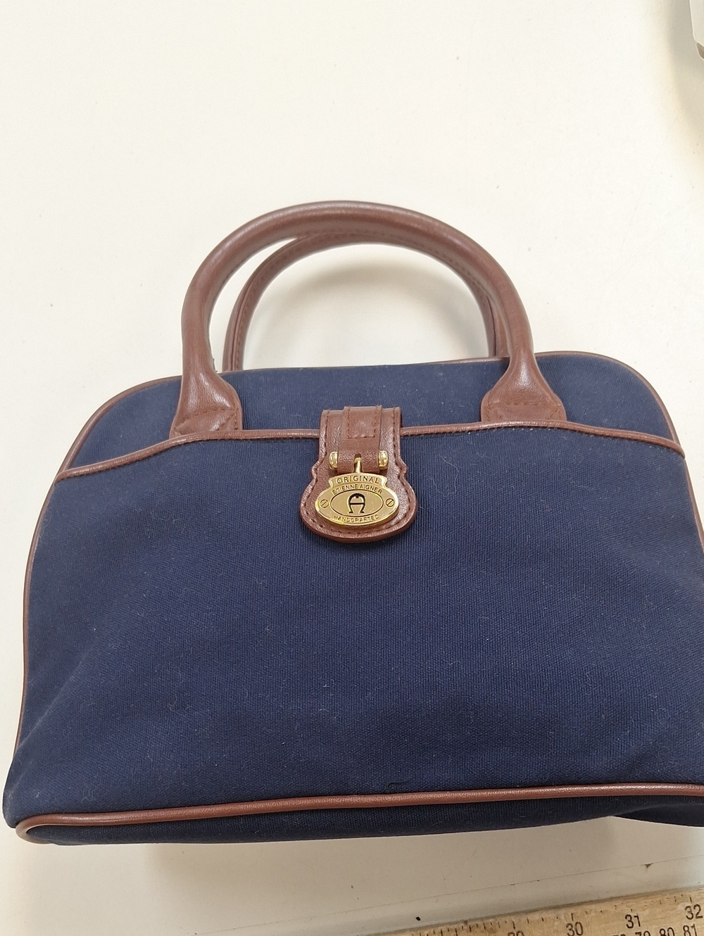 ETIENNE AIGNER. Navy Canvas Pouch with Brown Leather Trim